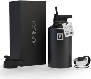 IRON °FLASK Camping & Hiking Hydration Flask, Wide Mouth, 3 Straw Lids, Stainless Steel Outdoor Water Bottle, Double Walled, Insulated Thermos, Metal Canteen - Midnight Black, 64 Oz